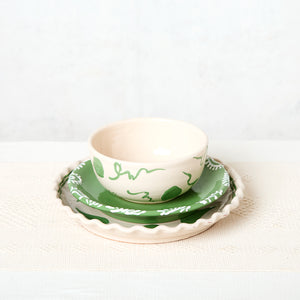 Basic modern tableware from Talavera de Puebla in green and off-white. (4 diners)