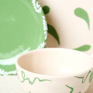 Basic modern tableware from Talavera de Puebla in green and off-white. (4 diners)