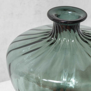 Decorative smoke-colored glass bottle