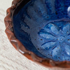 Blue glazed clay bowl