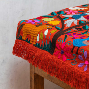 Zinacantán tile and multicolour embroidered tapestry