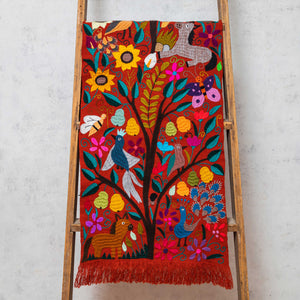 Zinacantán tile and multicolour embroidered tapestry