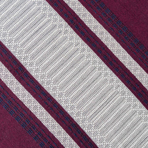 Pedal Loom Tassels Quilt in burgundy, beige and navy blue tones