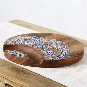 Table ronde en bois peinte en bleu et brut