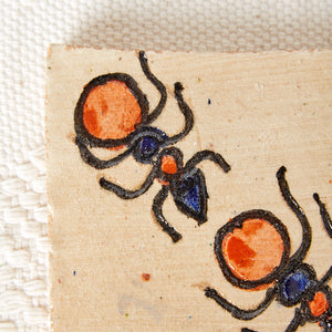 Dessous de plat en argile peinte 3 fourmis bleues et oranges