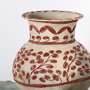 Beige vessel with tile details