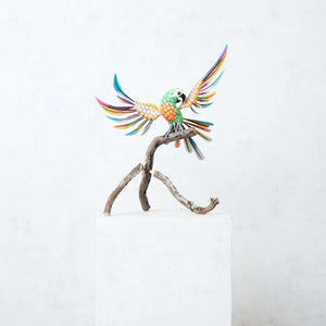 Green, yellow and multicolor alebrije parrot