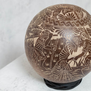 Dark brown carved gourd