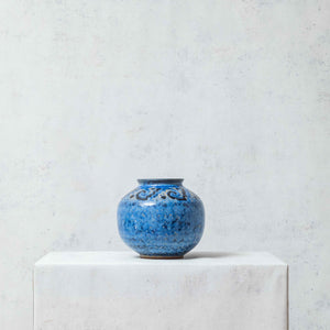Clay ball vase painted in blue with fretwork