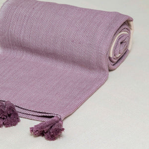 Lavender and ecru pedal loom Zig-Zag stripe blanket.