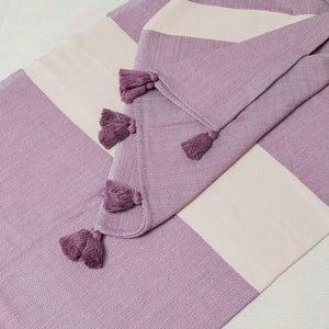 Lavender and ecru pedal loom Zig-Zag stripe blanket.