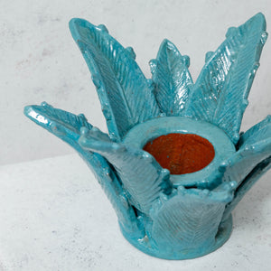 Turquoise glazed clay pineapple leaf candle holder