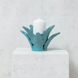 Turquoise glazed clay pineapple leaf candle holder
