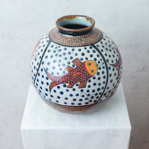 Red and yellow fish vase