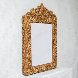 Golden carved wooden mirror