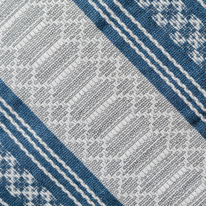 Blue and ecru pedal loom tassels cushion