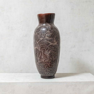 Burnished clay vase in black and white tones