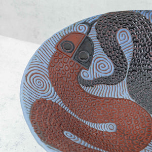 Dotted clay snakes plate