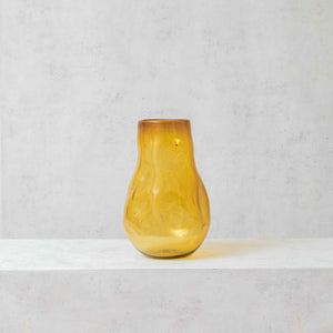 Irregular amber blown glass vase