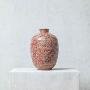 Pre-Hispanic clay symbol vase painted in terracotta tones