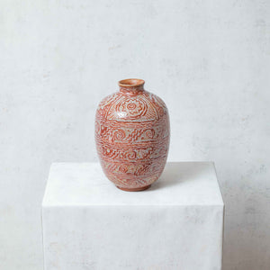 Pre-Hispanic clay symbol vase painted in terracotta tones