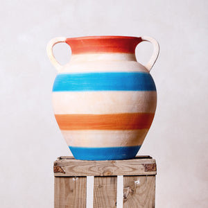 Painted clay vessel with blue and earth striped handles