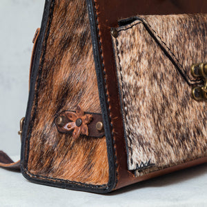 "Back pack" bag in leather and cowhide in brown tones