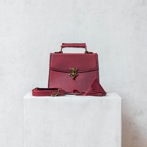 Burgundy leather Kelly style bag