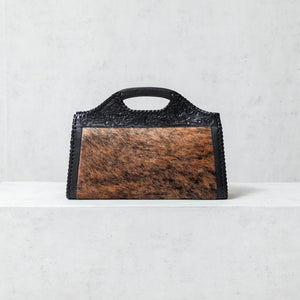 "Tote bag" made of embossed leather and cowhide in black and brown tones