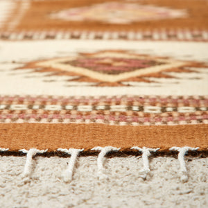 Wool rug with beige and brown borders