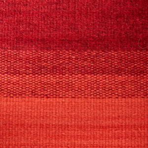 Gradient red wool rug