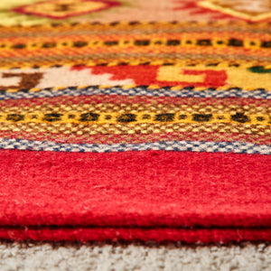 Red and mustard wool rug