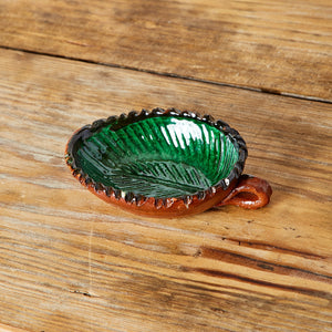 Green leaf glazed clay bowl