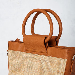 Jute and brown leather trapeze bag