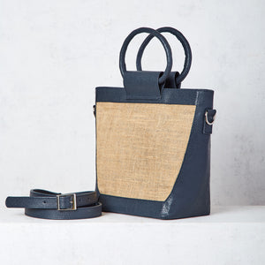 Navy blue jute and leather trapeze bag