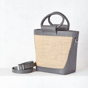 Jute and gray leather trapeze bag