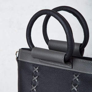 AV bag in black leather and gray stitching